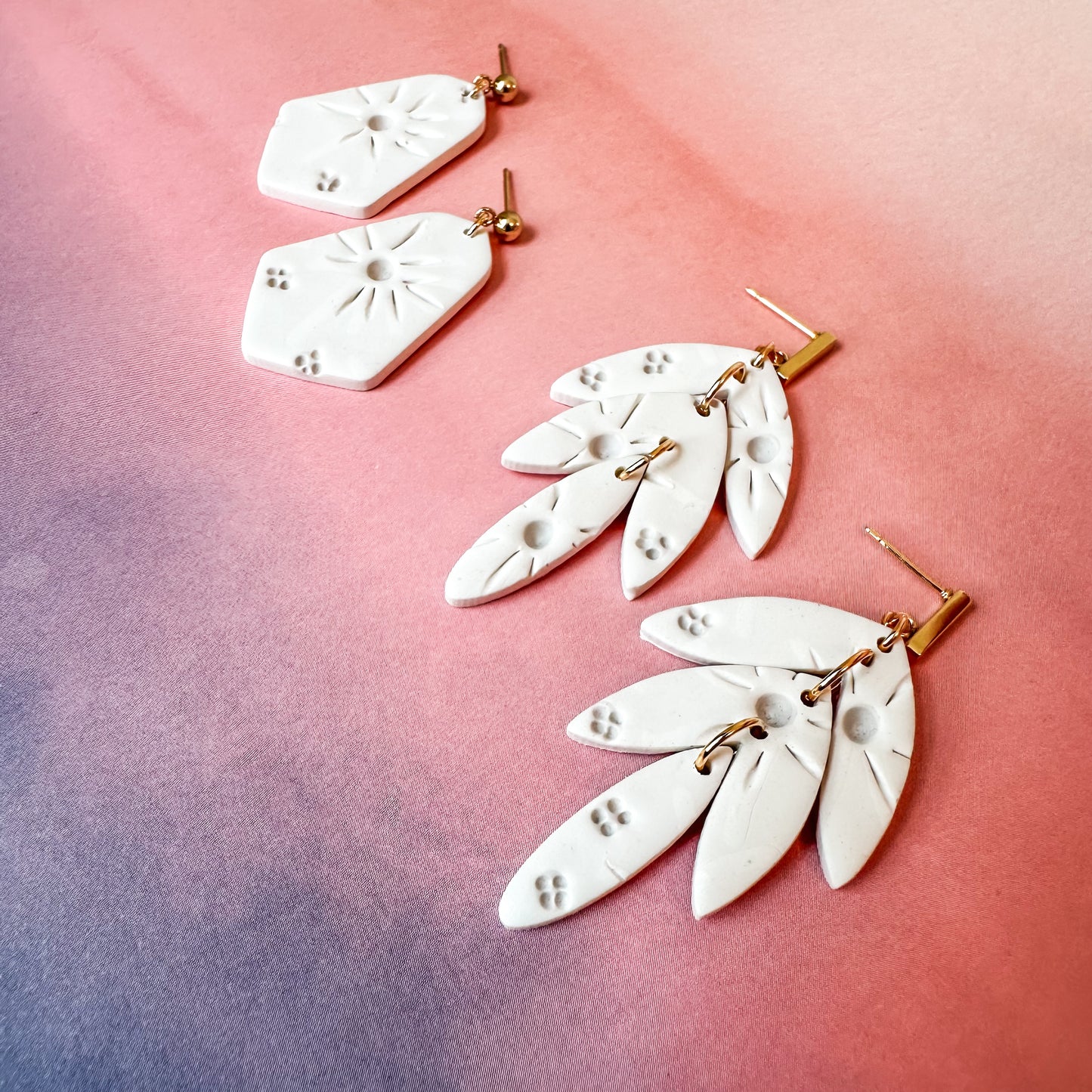 pointed bell dangle | creamer