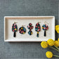 arched drop full textured dangle | peppercorn floral