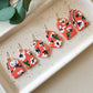 coral floral short arch dangles
