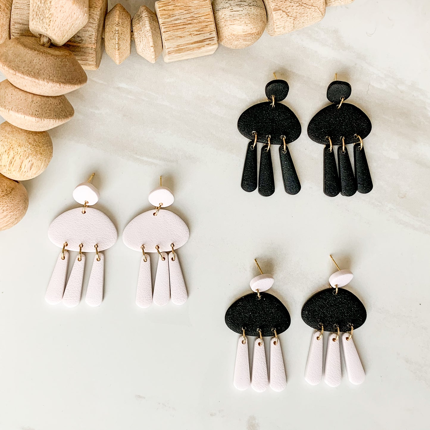 pebble textured dangle earrings | black & creamer