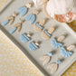 flower & petal painted dangle earrings | sky & ecru